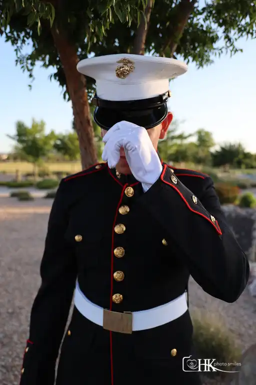 USA Marine hand on hat photo